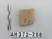 藏品(淺褐色夾砂陶把)的圖片